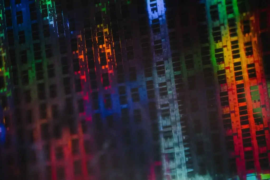 Macro image of a silicon wafer or dram chip die_jason-leung-jdB97u5ixCg-unsplash